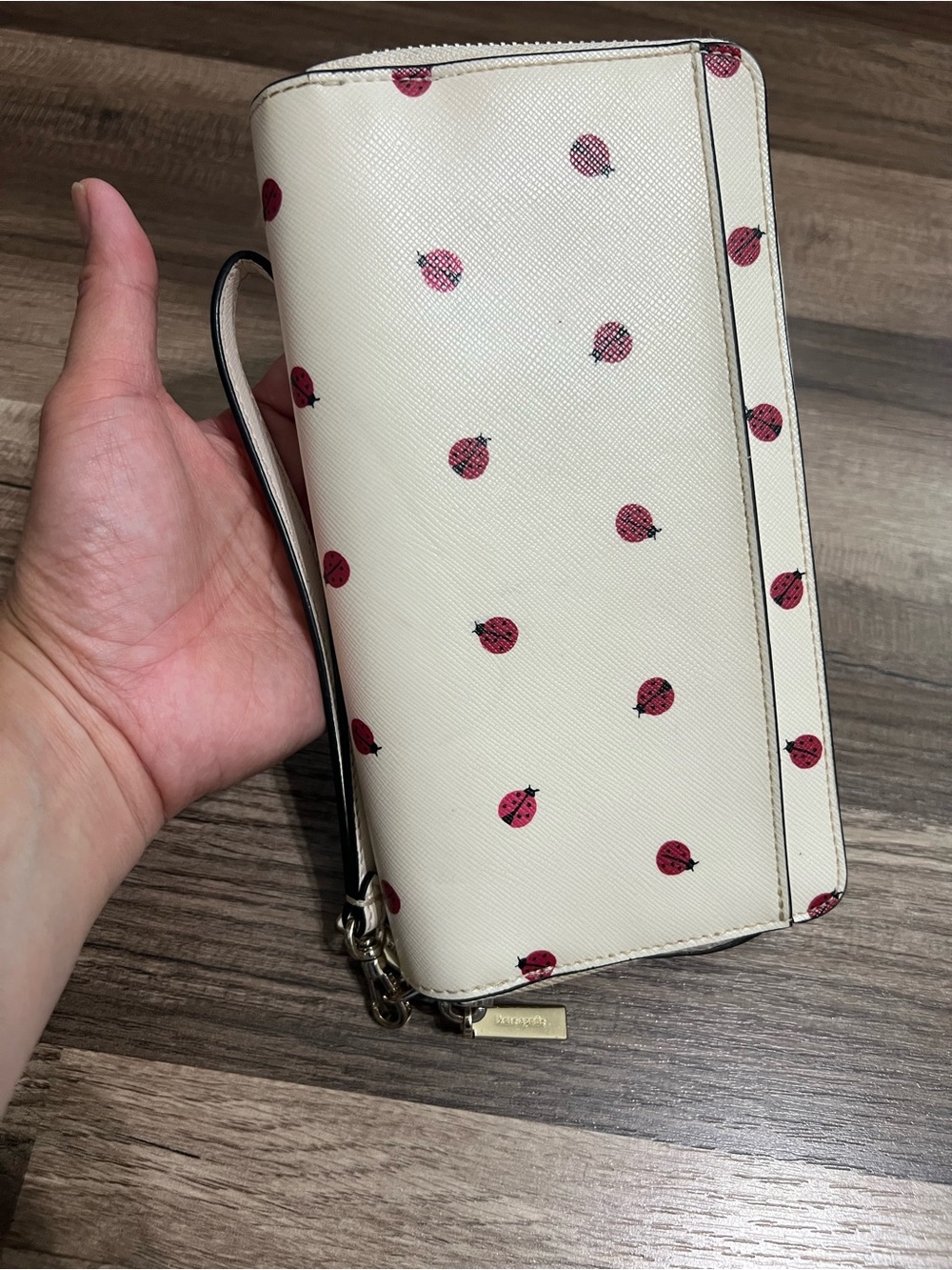 kate spade cream wristlet with red ladybug print - Picture 2 of 11